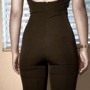 BEAUTIFUL SEXY BEBE JUMPSUIT WITH MESH &  BLING..SIZE SMALL